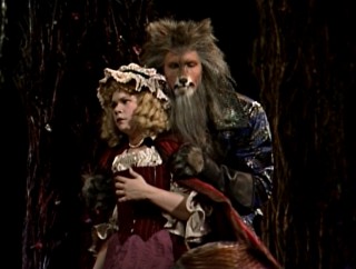 The Wolf (Rosten Westernberg) makes his move on obnoxious snacker Little Red Riding Hood (Danielle Ferland).