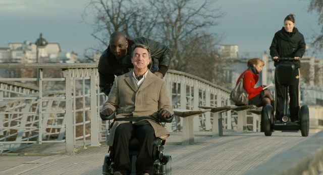 Driss (Omar Sy) and Philippe (Franois Cluzet) enjoy a fast ride on Philippe's souped-up wheelchair in the 2011 French comedy "The Intouchables."
