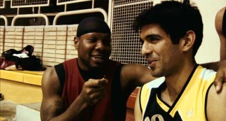 On the eve of the team's playoff game, Kevin Sheppard pretends to interview an Iranian teammate.