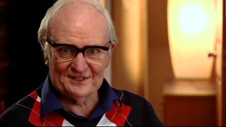 Jim Broadbent discusses Denis Thatcher, "The Man Behind the Woman" he's made up as here.