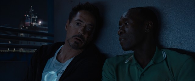 Without their armored suits that give them the nicknames Iron Man and War Machine/Iron Patriot, Tony Stark (Robert Downey Jr.) and Colonel Rhodes (Don Cheadle) team up against the odds in the dock-set climax.