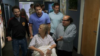 The guys lend their support around Dee as she prepares to give birth.