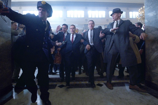 Attorney Bill Bufalino (Ray Romano) helps make way for Jimmy Hoffa (Al Pacino) and Frank Sheeran (Robert De Niro) in Martin Scorsese's "The Irishman."