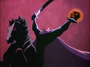 The Headless Horseman rides with a sword in one hand and a glowing head in the other.