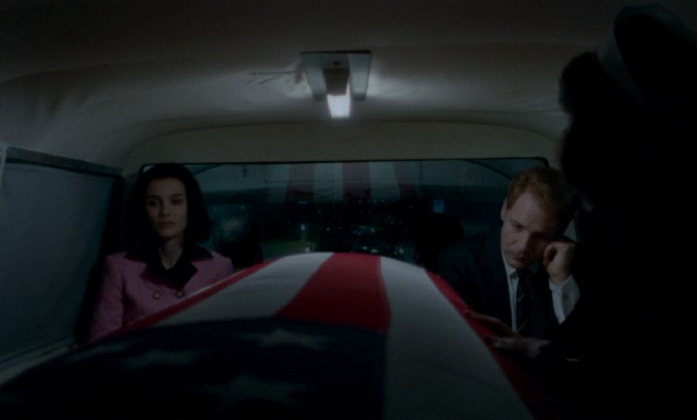 Jackie Kennedy (Natalie Portman) and Robert Kennedy (Peter Sarsgaard) sit in silence while riding along with the casket holding assassinated president John F. Kennedy, her husband and his brother.