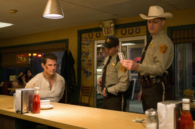 Brrrriiing! A pay phone call is about to save Jack Reacher (Tom Cruise) from being arrested in "Jack Reacher: Never Go Back."