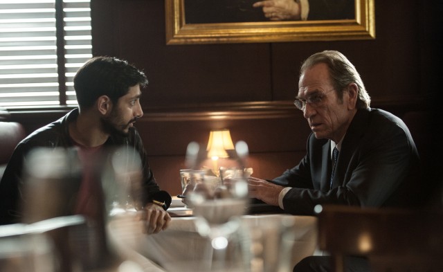 CIA Director Robert Dewey (Tommy Lee Jones) collaborates with tech entrepreneur Aaron Kalloor (Riz Ahmed) on a privacy-invading program.