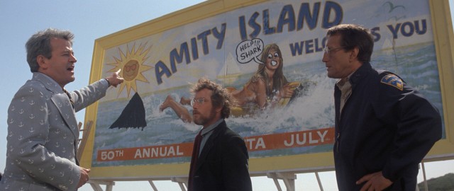 Amity Island's Mayor Larry Vaughn (Murray Hamilton) is more troubled by billboard vandalism than the shark problem it calls attention to.