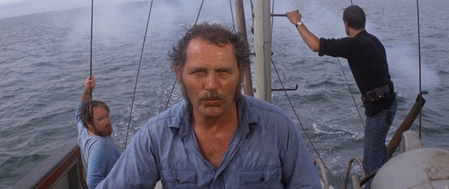 On the search for the killer Great White, the three protagonists of "Jaws" (Richard Dreyfuss, Robert Shaw, and Roy Scheider) keep their eyes open and barrels ready.