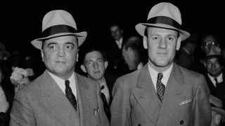 The real J. Edgar Hoover and Clyde Tolson pose for a photograph together in "J. Edgar: The Most Powerful Man in the World."