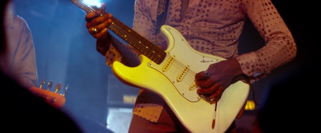 Jimi Hendrix handles his electric guitar as only he can in "Jimi: All Is By My Side."