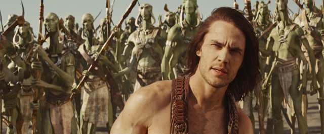 On Barsoom (Mars), John Carter (Taylor Kitsch) is a lone man among hordes of green Tharks.