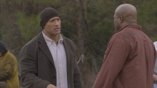 This deleted scene reveals that Hank (Dwayne Johnson) is in construction and wears the occasional wool cap.