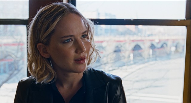 Joy (Jennifer Lawrence) cuts her hair and gets down to business in the film's Dallas-set climax.