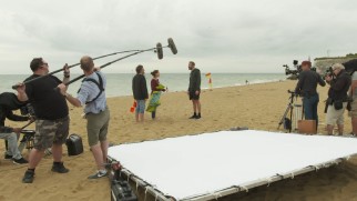 "Making 'Juliet, Naked'" provides a behind-the-scenes look at the filming of a beach sequence.