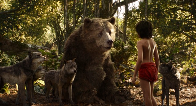 Baloo the bear and the wolves who raised him send Mowgli on his way.