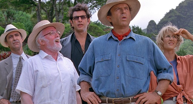 John Hammond (Richard Attenborough) welcomes Donald Gennaro (Martin Ferrero), Ian Malcolm (Jeff Goldblum), Alan Grant (Sam Neill), and Ellie Sattler (Laura Dern) to Jurassic Park.