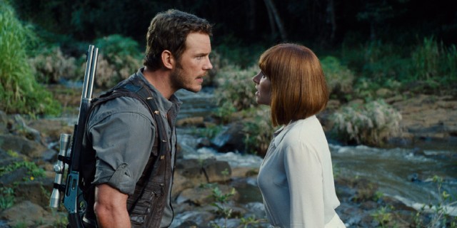 Owen (Chris Pratt) and Claire (Bryce Dallas Howard) are given a bit of a romantic comedy arc with their love-destined squabbles.