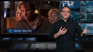 Director Colin Trevorrow talks about modeling certain aspects after the classic original 1993 "Jurassic Park", shown beside him.