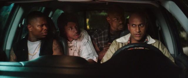 Posing as an Allentown Brother, Clarence (Keegan-Michael Key) schools the Blips on George Michael as they pass time before making a getaway.