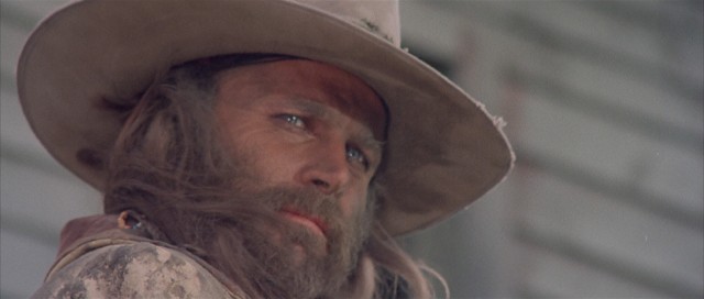 With long, flowing hair and a bushy beard, Franco Nero holds the iconic title role of Keoma.