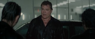 Markie Trattman (Ray Liotta) tries to convince his rainy nighttime visitors that he was not behind this latest robbery.