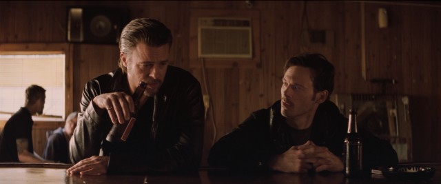 Contract mob enforcer Jackie Cogan (Brad Pitt) instills fear in Frankie (Scoot McNairy), one of the men behind the robbery.