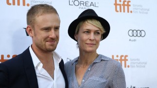 Hollywood's new It Couple, Ben Foster and Robin Wright Penn, smiles for the cameras on the red carpet at the Toronto Film Festival.
