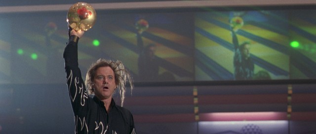 Bill Murray steals the movie repeatedly as Ernie "Big Ern" McCracken, Roy's rival with a wild combover and a flamboyant rose-suspending bowling ball.