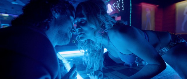Terrence Malick briefly opts for a Nicholas Winding Refn aesthetic, as Rick (Christian Bale) takes a liking to Karen (Teresa Palmer), a free-spirited stripper from Australia.