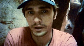 Clinging to his sanity and some form of communication, Aron (James Franco) documents his experiences on his camcorder from time to time.