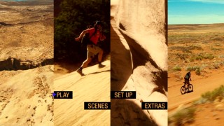 Aron's early adventures and Canyonlands National Park scenery share the screen in the DVD's main menu montage.