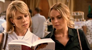 Lisa (Cheryl Hines) and Thea (Lindsay Lohan) learn a few things about pregnancy on the maternity store's checkout line.