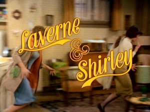 Laverne and Shirley race to work as the series logo appears.