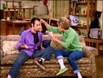 Laverne hopes pulling on Squiggys receding hairline will get him to pay attention.
