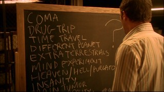 Sam fills a chalkboard with possible theories for his temporal relocation back to 1973.
