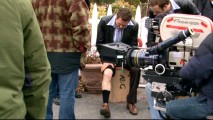 Jason O'Mara, his stunt double, and assorted crew members take a look at the knee boo-boo he receives in "Sunrise to Sunset."