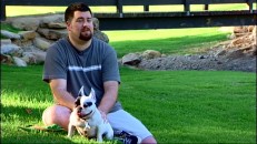 Writer/director Dean DeBlois sits with his dog while talking about Lilo & Stitch in Disc 2's 2-hour documentary.