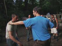 Actors Matthew Fox and William Mapother practice a hodgepodge, feral form of fight choreography for an upcoming scene.