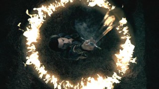 Richard Cypher (Craig Horner) dramatically raises the Sword of Truth during his initiation as Seeker.