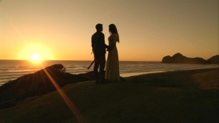 Richard (Craig Horner) and Kahlan (Bridget Regan) have an intimate sunset to themselves on a beach.
