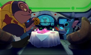 Jumba offers his creation a cookie in the captivating short film "The Origin of Stitch."