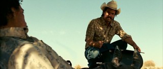 Texas welder Llewelyn Moss (Josh Brolin) finds a two million dollar satchel, instantly changing the course of his life.