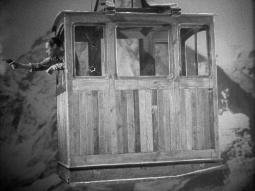 Okay, so maybe it doesn't look like Gus/Dicky/Ulrich (Rex Harrison) is really riding a cable car across the Swiss Alps, but the film's gunfight finale still excites.
