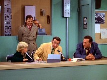 Howard Cosell plays the challenging role of himself as Oscar, Felix, and a young Cosell fan look on.