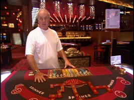 Producer and occasional actor Jerry Weintraub shows off the Bank Casino set created for "Ocean's Thirteen."