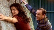 Fellow private school parent Mike Gay (Tom Papa) tries to talk a depressed Christine down from a rock climbing wall.