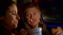 Looking for pot, Christine settles for an in-car fast food meal with a man whose name she can't remember (Dave Foley).