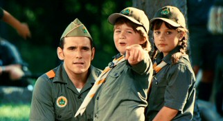 Zach (Conner Rayburn) and Emily (Ella Bleu Travolta) point to their two new dads, giving serious Troop Master Barry (Matt Dillon) the wrong idea.