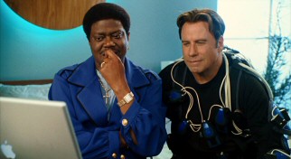 In his last film released, late comedian Bernie Mac plays Jimmy Lunchbox, an entertainer who lets Charlie (John Travolta) try out his human puppeteering technology.